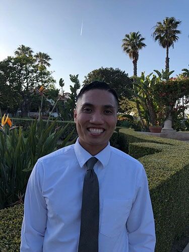 Dr. Acasio, associate dentist at Carson & Carson